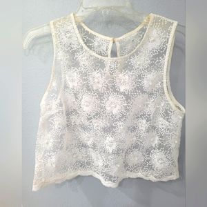 Lace vest with pearl embellishments